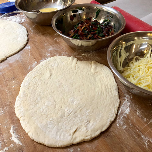 Prepare to assemble the Delicious Breakfast Calzones